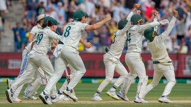 Australian players celebrates after winning the fourth Test against India at the Melbourne Cricket Ground by 184 runs. The final wicket was taken by Nathan Lyon as he dismissed Mohammed Siraj (AP Photo/Asanka Brendon Ratnayake)